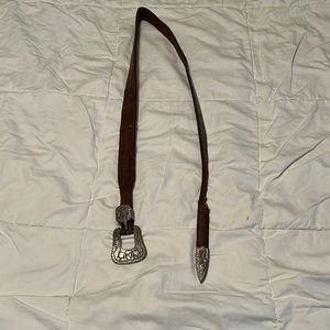 Cowgirls built, silver buckle and end